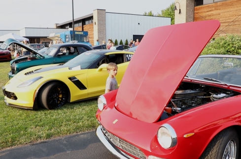 Young child looking at classic car at Throttlestop